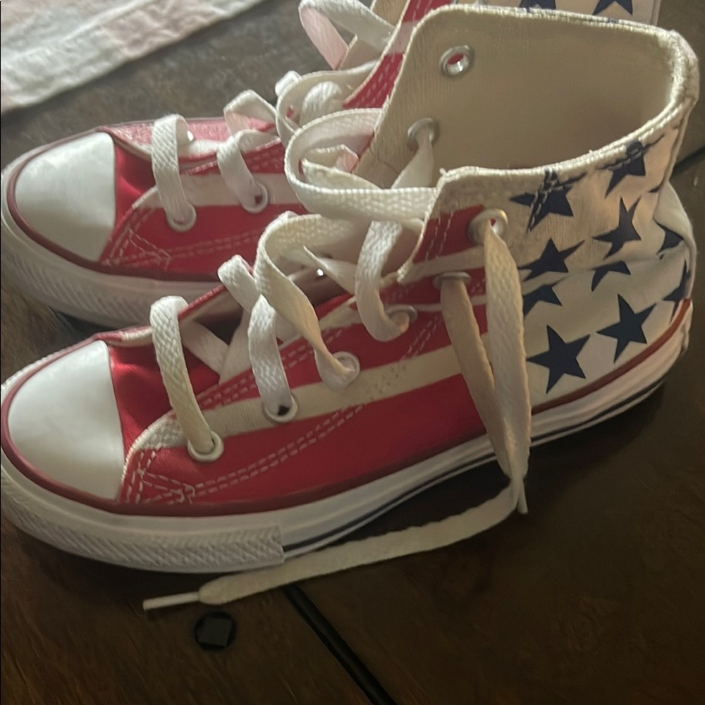 Red and White High-Top Sneakers with Blue Stars
